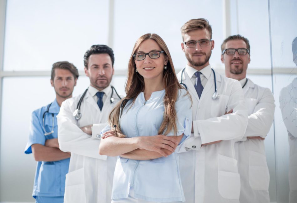 group-doctors-nurses-standing-hospital-room-1.jpg